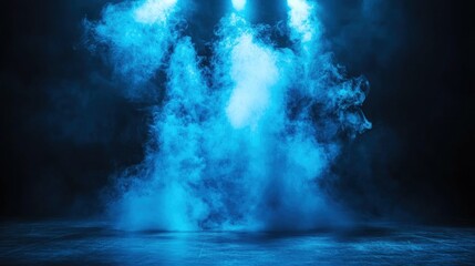 Blue smoke illuminated by spotlights on dark floor