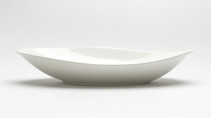 Elegant white porcelain serving bowl with a unique, sculpted, organic shape