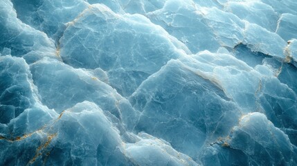 A detailed, close-up view of  blue marble texture with gold veins