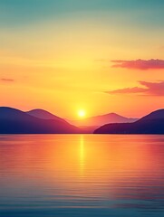 Fototapeta premium Spectacular golden sunset view over tranquil lake and mountain silhouettes