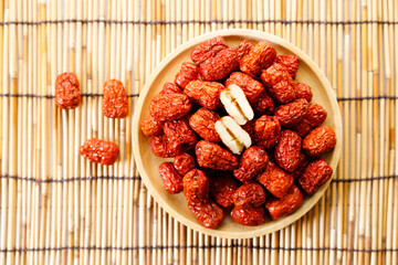 Dried red Chinese dates, jujube in a bowl