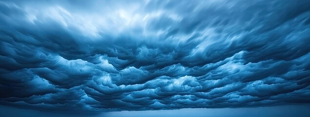 Dark sky idea. Dramatic dark clouds gathering over the ocean before a storm.