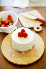 Homemade strawberry shortcake topped with fresh strawberries.