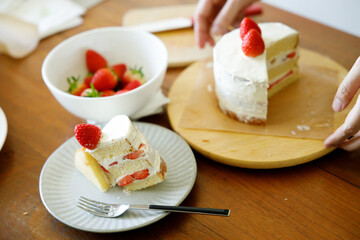 Homemade strawberry shortcake topped with fresh strawberries.