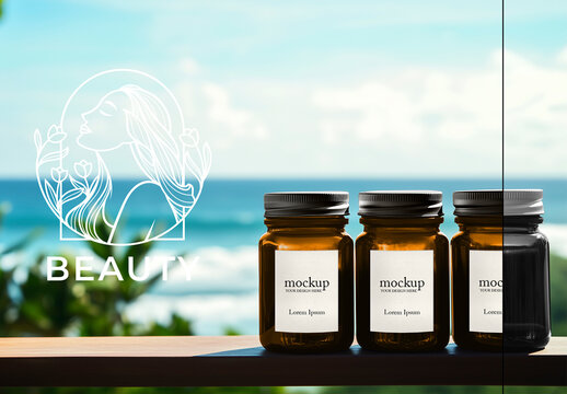 Mockup of Amber Glass Jars with Custom Labels Against Tropical Beach Background