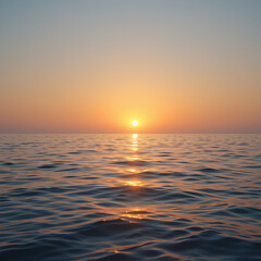Fototapeta premium scene captures a peaceful sunrise as first rays of light emerge over horizon illuminating calm sea and symbolizing start of a fresh day