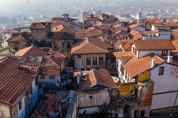 Aerial view of historic Ankara with red-tiled roofs.
