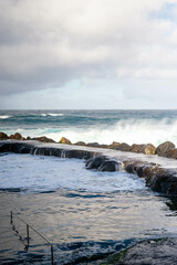 Natural swimming pool in ocean