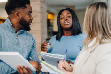 Students sharing ideas and brainstorming during study session