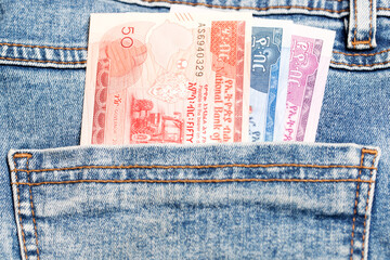 Ethiopian Birr in the pocket of blue jeans