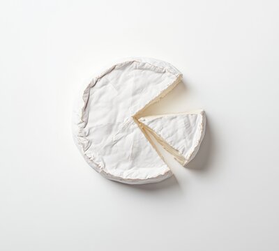 Brie Cheese Round with Slice Removed on Clean White Background