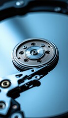 Close-Up of Hard Drive Mechanism with Reflective Surface and Lights