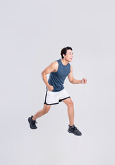 Portrait of healthy Asian man exercising on white background