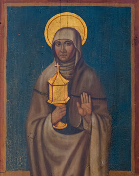 Beuil, FRANCE - 03-04-2025: Painting (19th century) of St. Clare of Assisi was one of the first disciples of Saint Francis of Assisi. She founded the Order of St. Clare.