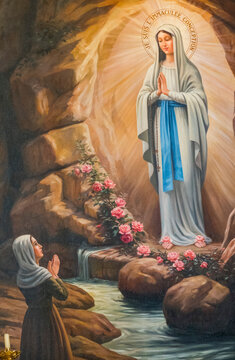 L&rsquo;Escarène, FRANCE - 03-05-2025: Painting (19th century) of Apparition of the Virgin Mary, Our Lady of Lourdes or Notre Dame de Lourdes to Bernadette Soubirous.