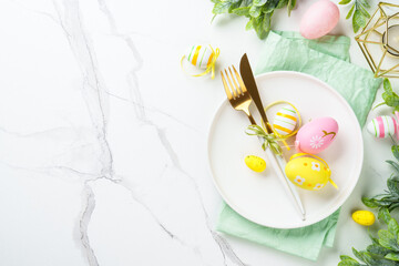 Easter table setting on white background.