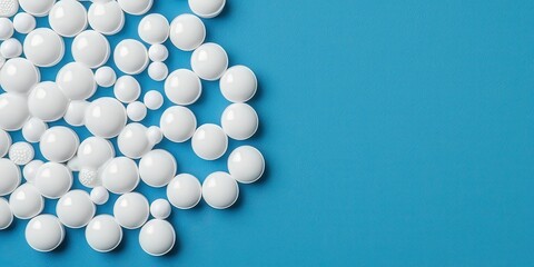 material science composites concept. White circular objects scattered on a blue background.