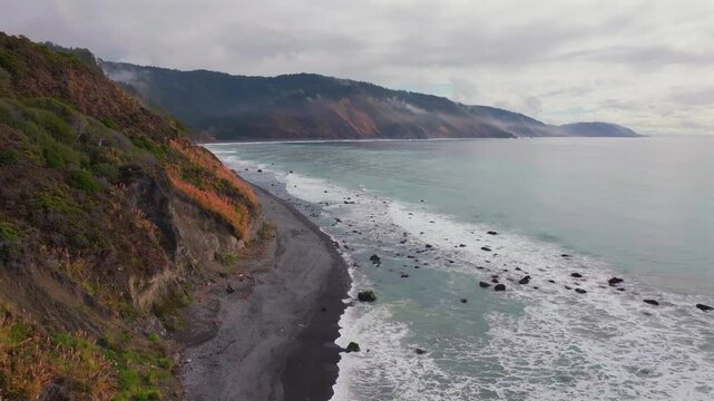 USAL Beach vibrant Pacific Ocean landscape scene Sinkyone Wilderness Lost Coast Trail California aerial drone rugged untouched coastline rain mist morning remote untouched waves crashing upwards