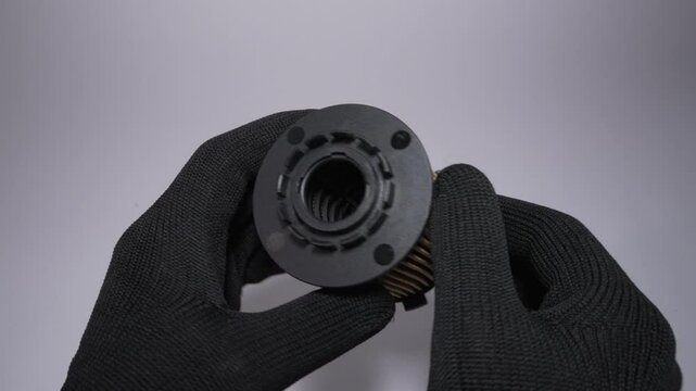 The fuel filter component is designed for use with black gloves
