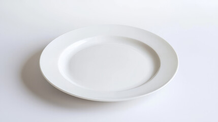 Plain white plate on a neutral background for minimalistic food presentation. isolated on white background.