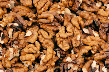 Walnut kernels isolated on white background. Walnuts close-up. Healthy eating. Half of walnut isolated. Peeled walnut on white.