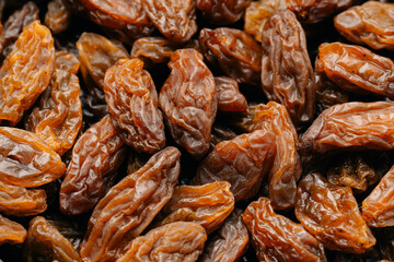Raisins on a white background. Dried grapes.