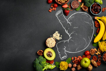The best foods for healthy stomach and digestion. Assortment of natural products to boost stomach...