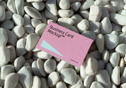 Business Card Laying on Pebbles Mockup
