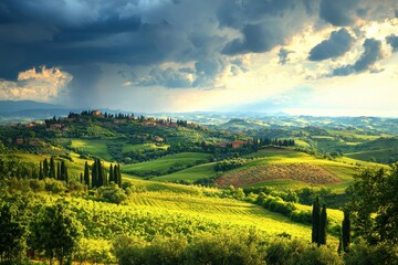 Breathtaking panoramic view of the Tuscan countryside with rolling green hills, picturesque villages, and a dramatic sky creating a serene and idyllic landscape.