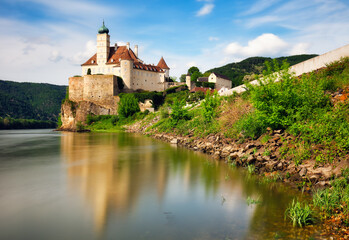 Fototapeta premium Austria Small castle Schonbuhel above the Danube with reflection in water