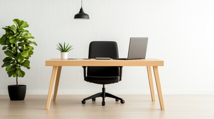 Fototapeta premium A minimalist, clean home office setup features a light wood desk with a laptop, a black office chair, and two potted plants against a white wall, illuminated by a hanging black pendant light