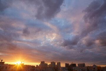 Fototapeta premium Urban Sunset with Silhouetted Buildings