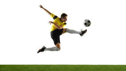 Side view dynamic image of man, soccer player in motion, kicking ball mid-air isolated on white background. Concept of sport, competition, game, active lifestyle. Copy space for ad, text © master1305
