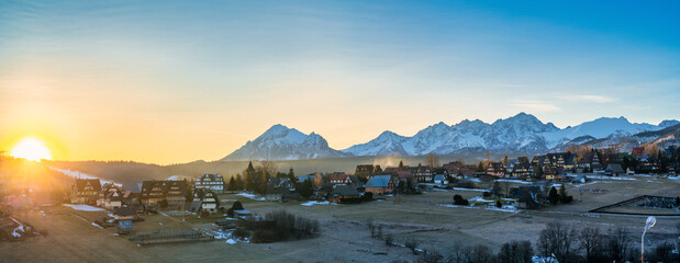 Tatra mountains at sunrise seen from Murzasichle village in Poland © Pawel Pajor