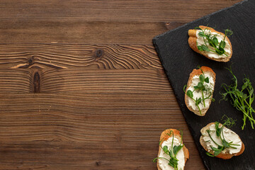 Sandwiches with fresh sprouting microgreens. Sprouted peas seeds micro greens. Vegan food