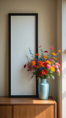 Modern room design with blank canvas displayed on rustic wooden furniture vase of wildflowers completing the space Interior design inspiration stock photo