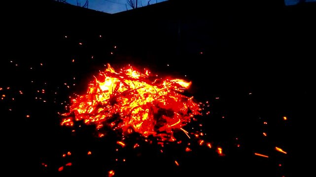 A fire burning outside ash danger