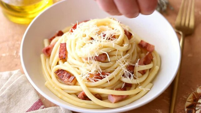 Pasta bucatini carbonara with cheese and pancetta. Italian food.