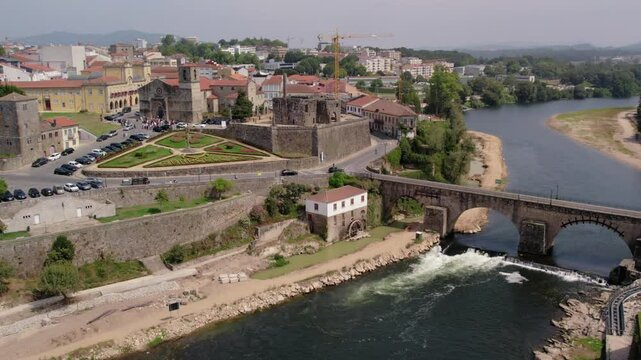 Barcelos Castle ruins and Igreja Matriz de Barcelos in historic center - drone