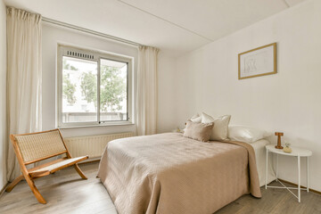 A serene and stylish bedroom featuring a neutral color palette, minimalist decor, and natural light flowing through the window, perfect for relaxation.