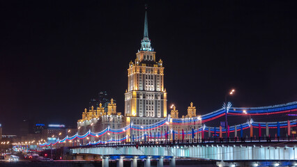 Hotel Ukraine winter night timelapse hyperlapse with bridge over Moscow River.
