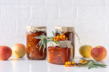 Seabuckthorn and Apple Jam Jars. Close-up.