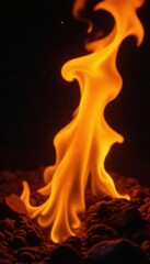 Fototapeta premium Flickering fire, deep orange to pale yellow, against absolute black , vibrant, flame