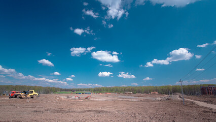 Panoramic landscape transform into urban area with machinery timelapse.