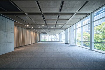 Empty modern office space with large windows