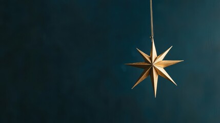 Golden Star Hanging in Minimalist Setting with Soft Background and Subtle Lighting for Elegant Decor