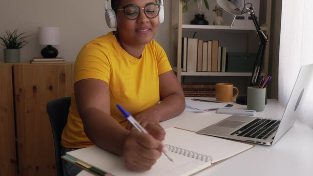 Young black woman working from home in slow motion