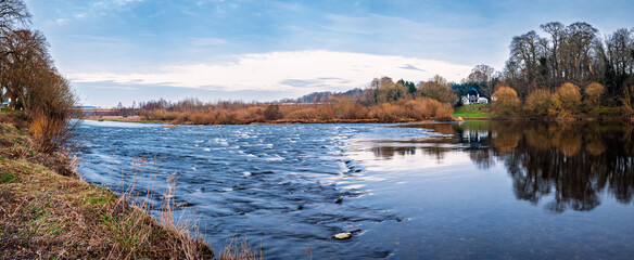 Panorama of River Tweed above Hunters Bridge at Kelso.  The River Tweed is 97 miles long from...