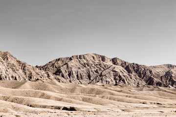 Rugged, arid landscape in eastern Iran, the Middle East. Mountains and vast plains.