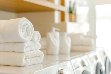 Freshly Folded White Towels Stacked Neatly Beside Modern Washing Machines in a Clean Laundry Room